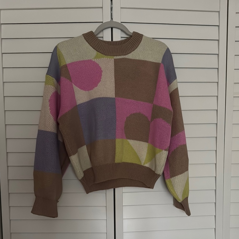 Lush Pink and Purple Crew Neck Sweater with Retro Geometric Design